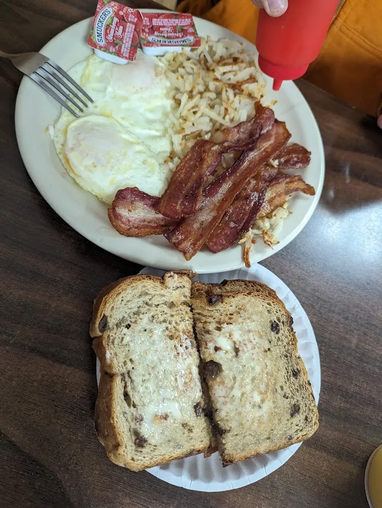 Two Eggs Bacon Hash Browns & Cinnamon Raisin Toast